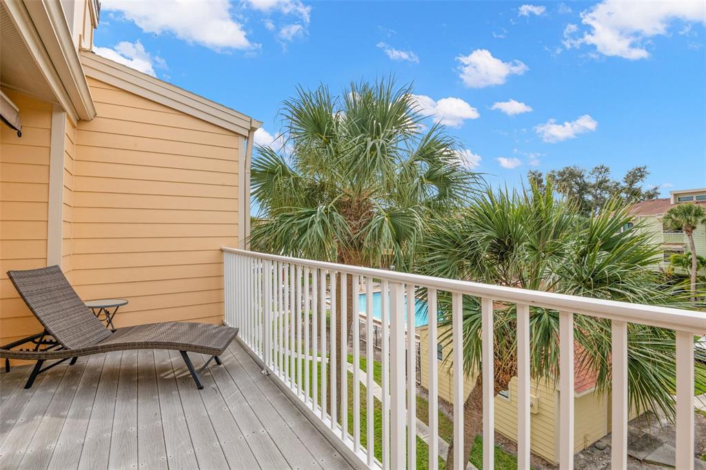 529 Sandy Hook Road Treasure Island, FL 33706 - Photo 27 of 55 a view of a balcony with chairs