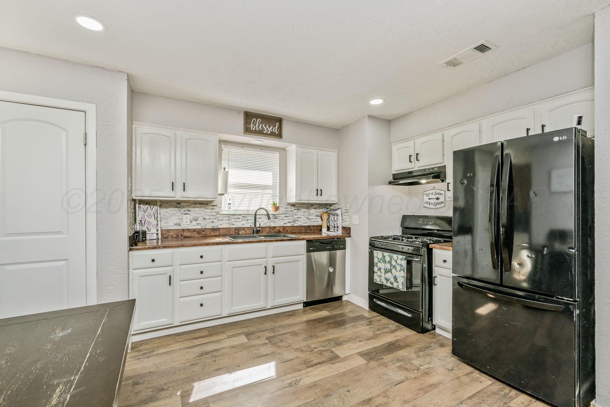 5207 South Travis Street Amarillo, TX 79110 - Photo 6 of 24 5207 S Travis St 09