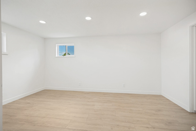 1168 East Center Street Bountiful, UT 84010 - Photo 33 of 38 Bright room featuring wood-finish flooring and recessed ceiling lighting