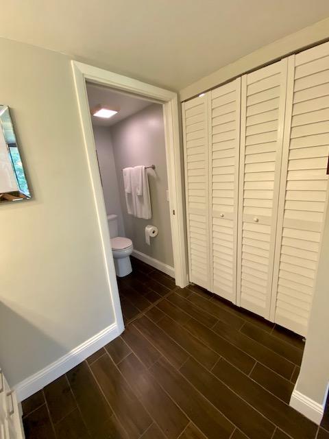 6181 Balboa Circle, Unit 205 Boca Raton, FL 33433 - Photo 19 of 27 a bathroom with a sink and a toilet