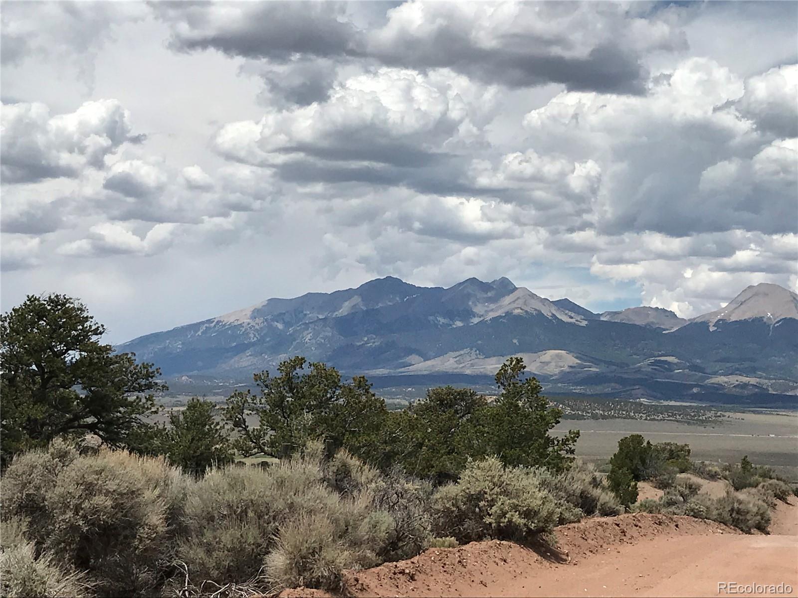 123 Mitchell Road Fort Garland, CO 81133 - Photo 32 of 40 a view of a lake in middle of forest