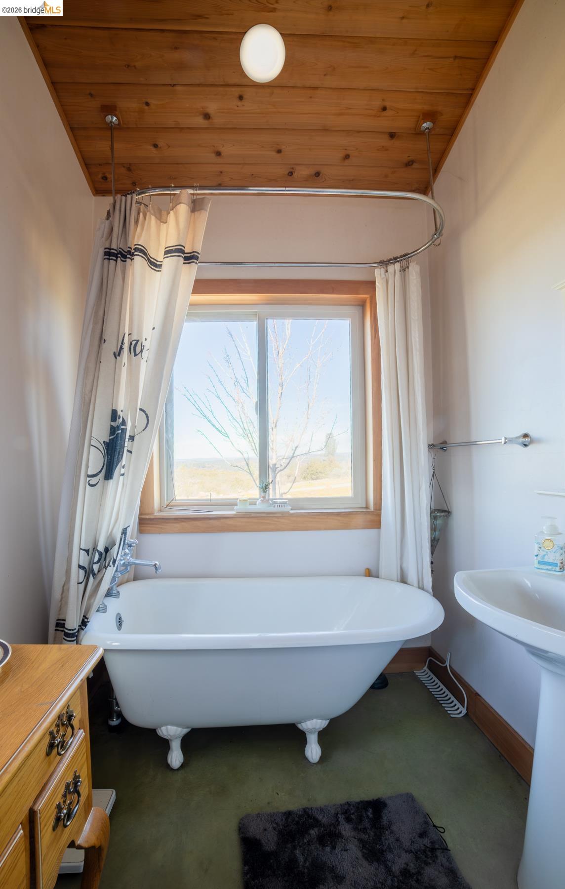 6899 Eagle View Drive Mountain Ranch, CA 95246 - Photo 18 of 35 a bathroom with a bathtub sink and toilet
