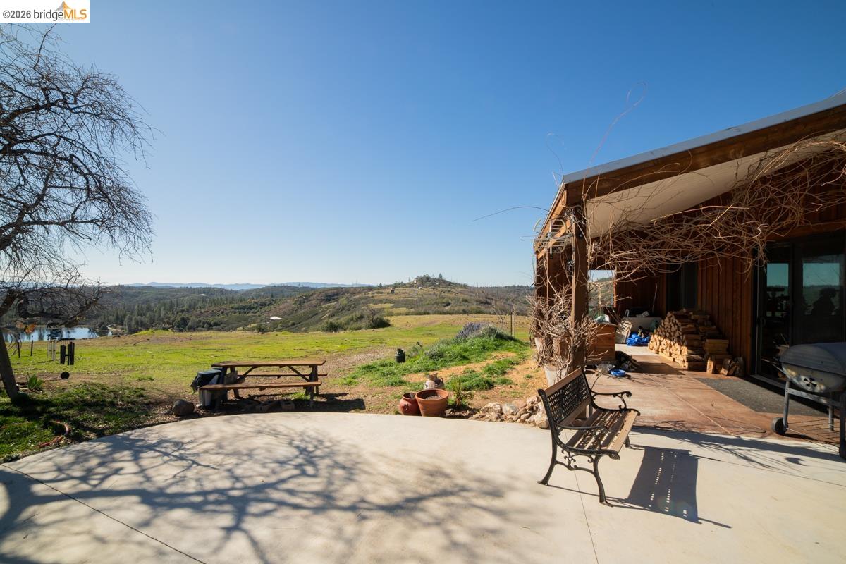 6899 Eagle View Drive Mountain Ranch, CA 95246 - Photo 7 of 35 a view of a swimming pool and an ocean view