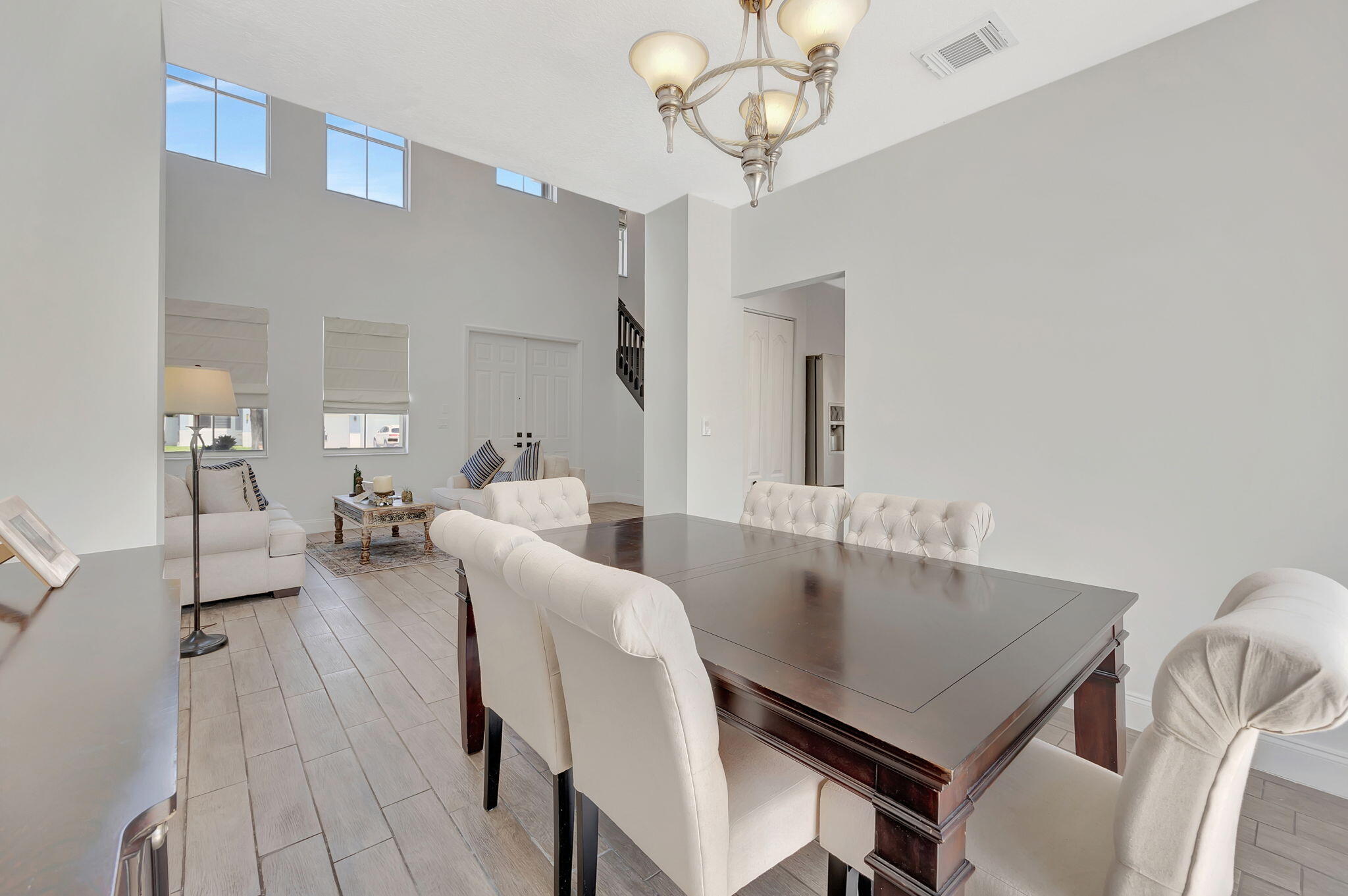 13838 Southwest 41st Terrace Miami, FL 33175 - Photo 9 of 68 a view of a dining room with furniture and wooden floor