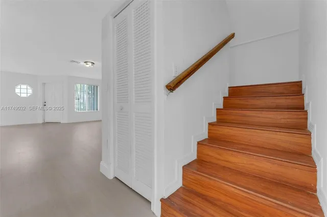 a view of entryway with wooden floor
