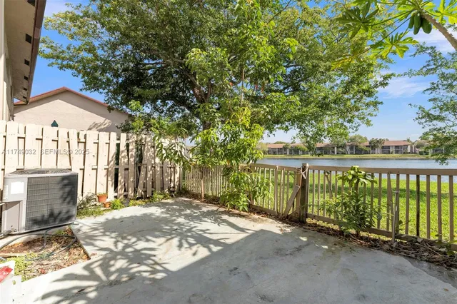 a view of a street with a trees