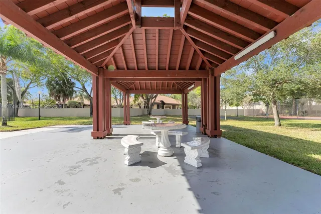 a view of swimming pool with a patio