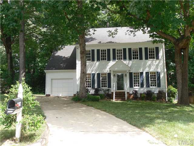 8716 Master Court Raleigh, NC 27615 - Photo 3 of 15 front view of a house with a yard