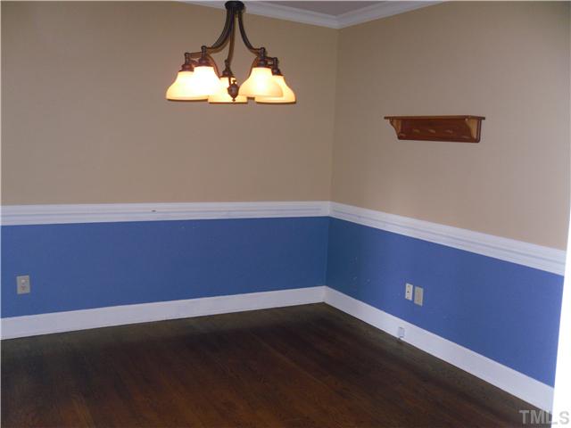 8716 Master Court Raleigh, NC 27615 - Photo 6 of 15 a room with table and chair