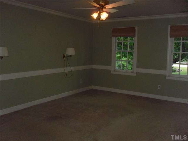 8716 Master Court Raleigh, NC 27615 - Photo 10 of 15 an empty room with a window