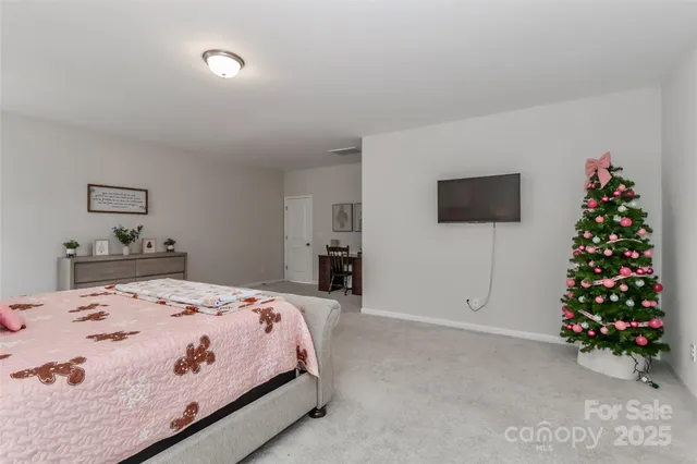 a bathroom with a sink mirror and vanity