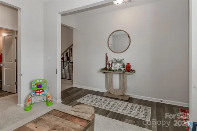 a bathroom with a sink mirror and vanity