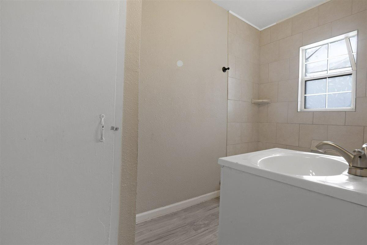 3302 Bates Street Lubbock, TX 79415 - Photo 9 of 11 Primary Bathroom