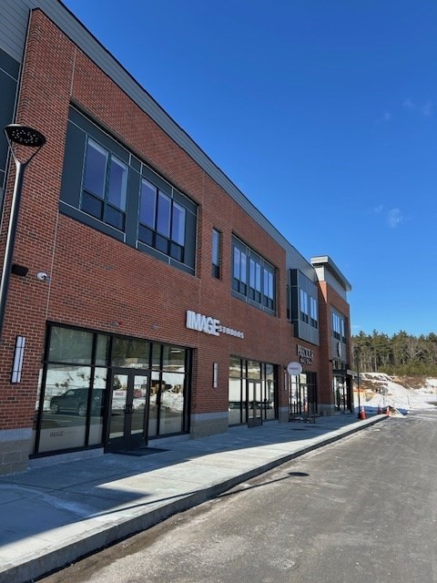 148 Old Post Road, Unit 216 Sharon, MA 02067 - Photo 21 of 22 a front view of a building