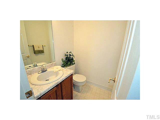 201 Reedhaven Drive Cary, NC 27513 - Photo 10 of 20 Half bath with vanity.