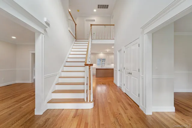 a view of entryway with wooden floor