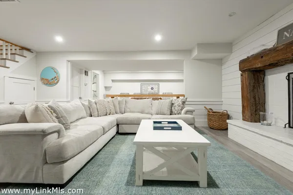 a living room with furniture and a table