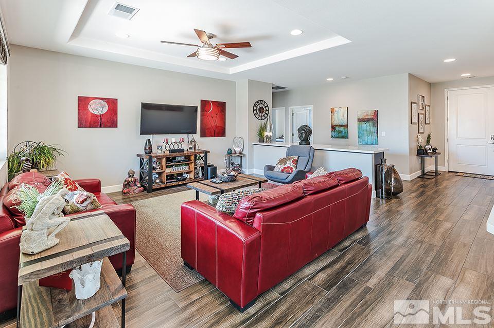 512 Alpine Rose Ct. Reno, NV 89521 - Photo 4 of 17 a living room with furniture and a flat screen tv
