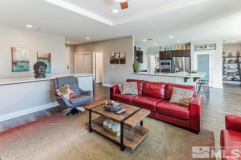 512 Alpine Rose Ct. Reno, NV 89521 - Photo 8 of 17 a living room with furniture and a table