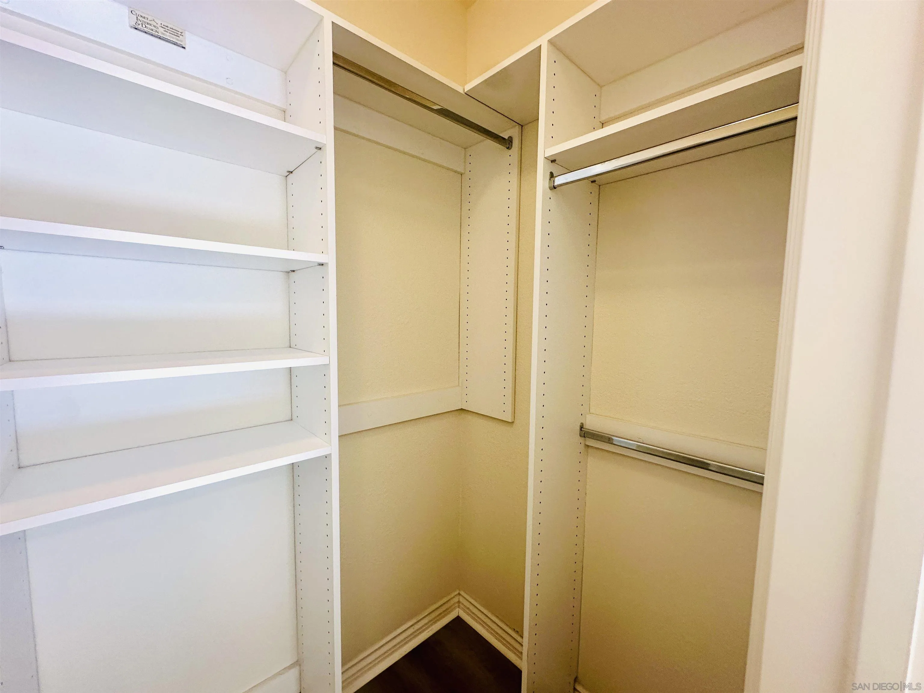 9263 Regents Road, Unit B204 La Jolla, CA 92037 - Photo 11 of 17 a view of walk in closet with empty racks