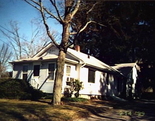 56 North Street Ridgefield, CT 06877 - Photo 1 of 1 a front view of a house with a tree