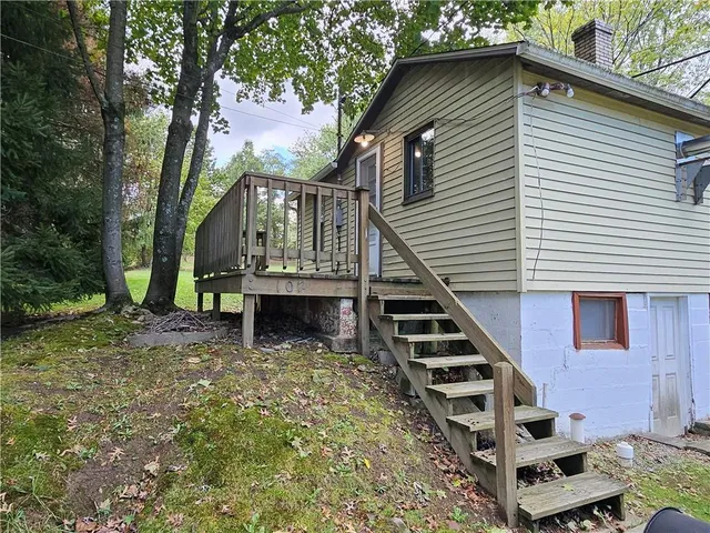 a view of backyard with green space