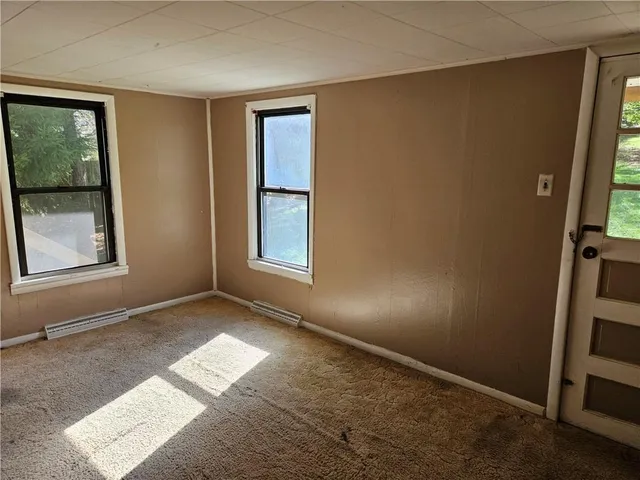 an empty room with windows