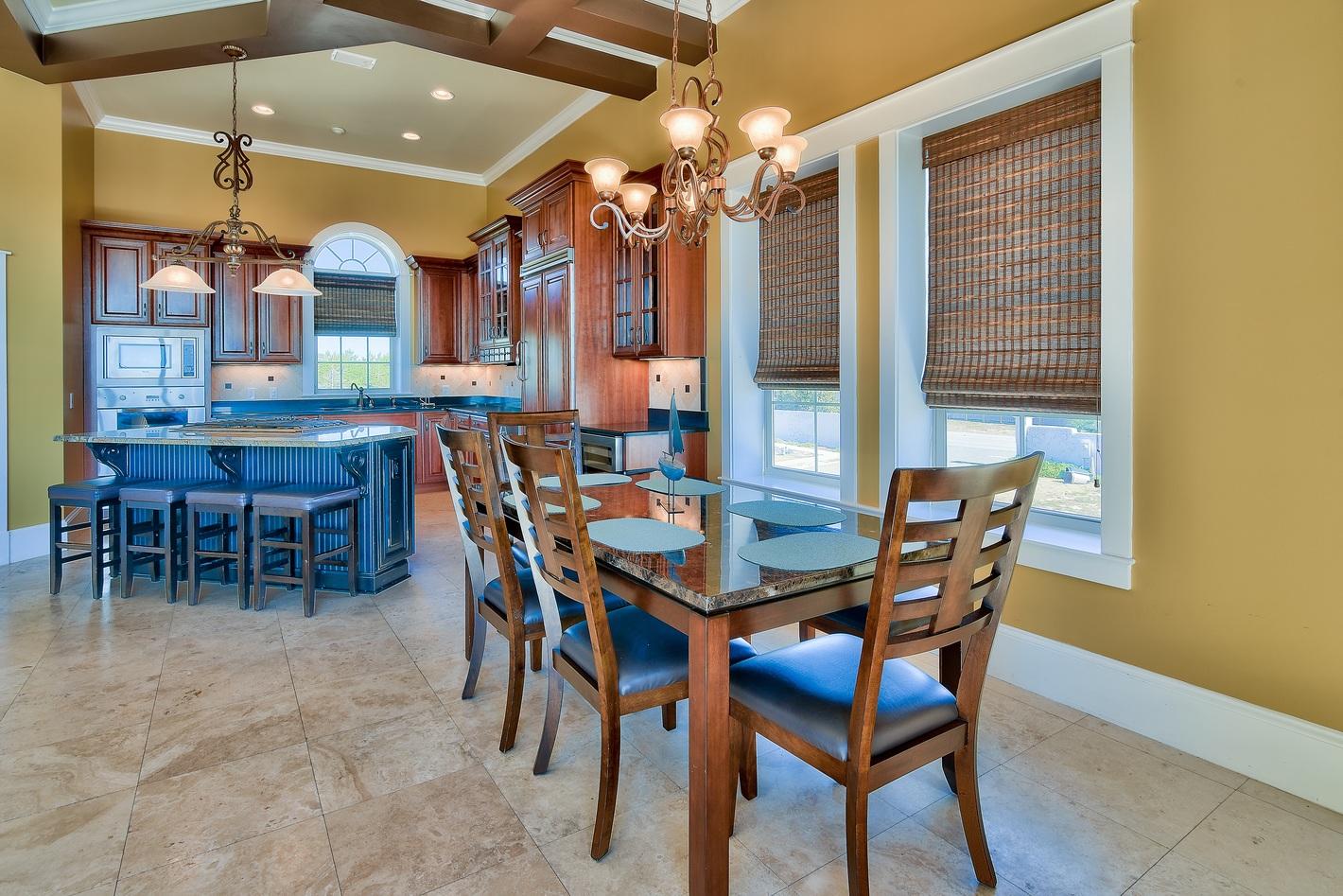 72 South Wall Street Inlet Beach, FL 32461 - Photo 11 of 27 a view of a dining room with furniture and chandelier