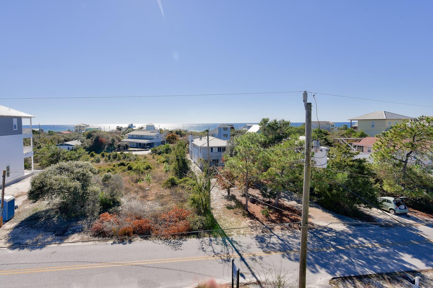 72 South Wall Street Inlet Beach, FL 32461 - Photo 19 of 27 a view of a house with a yard and street