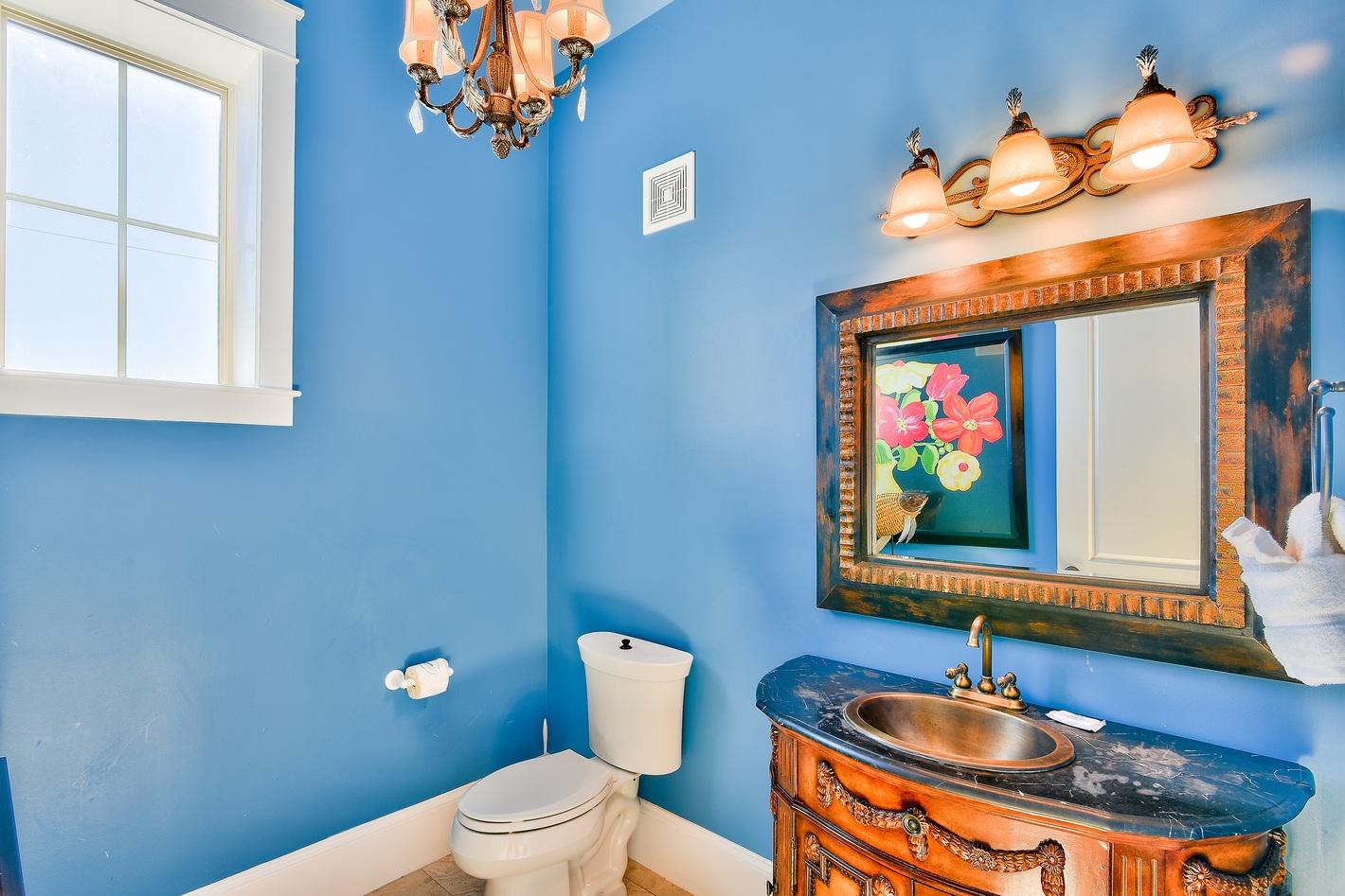 72 South Wall Street Inlet Beach, FL 32461 - Photo 26 of 27 a bathroom with a toilet sink and mirror