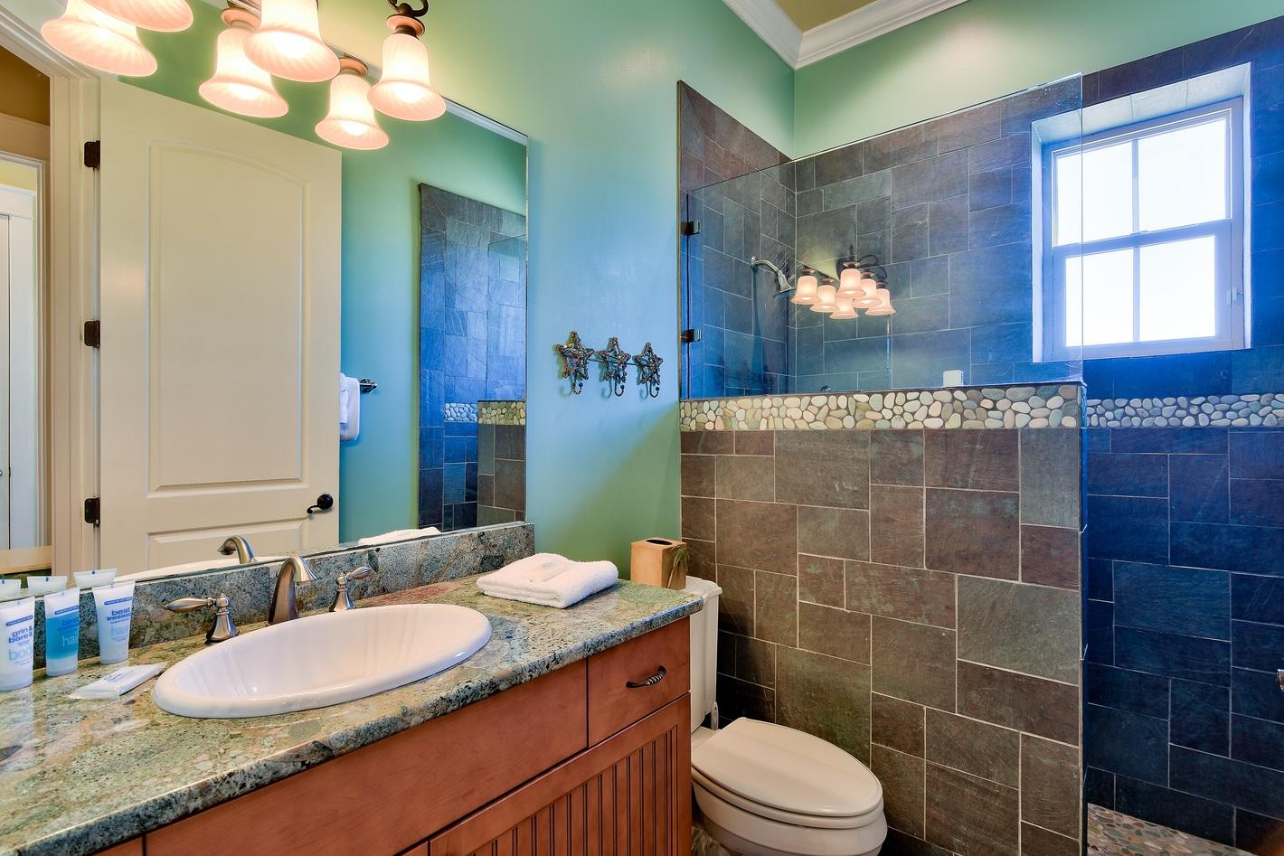72 South Wall Street Inlet Beach, FL 32461 - Photo 5 of 27 a bathroom with a granite countertop toilet sink and mirror