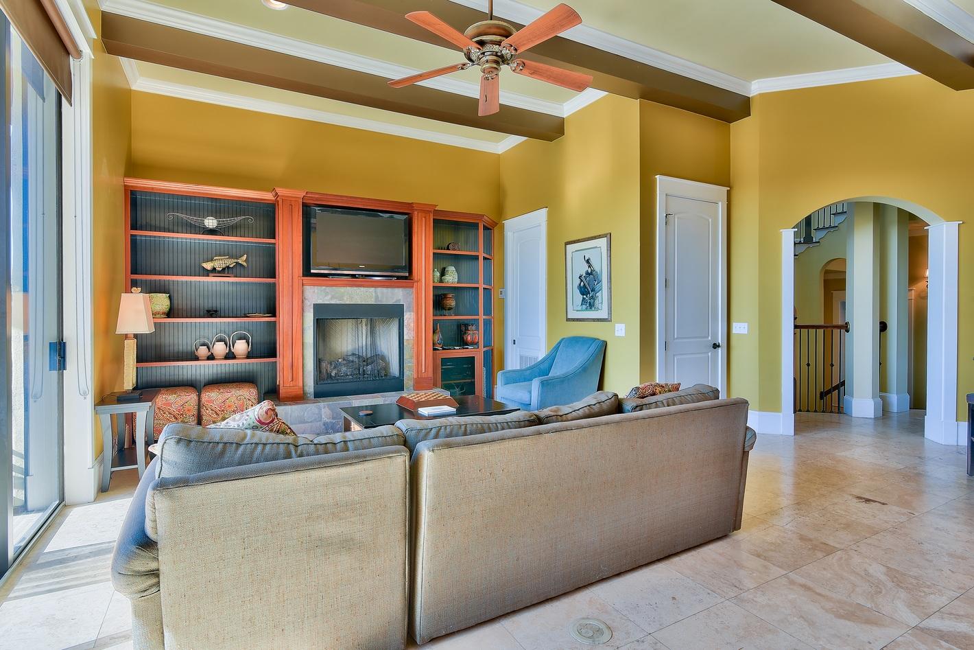 72 South Wall Street Inlet Beach, FL 32461 - Photo 8 of 27 a living room with fireplace furniture and a floor to ceiling window
