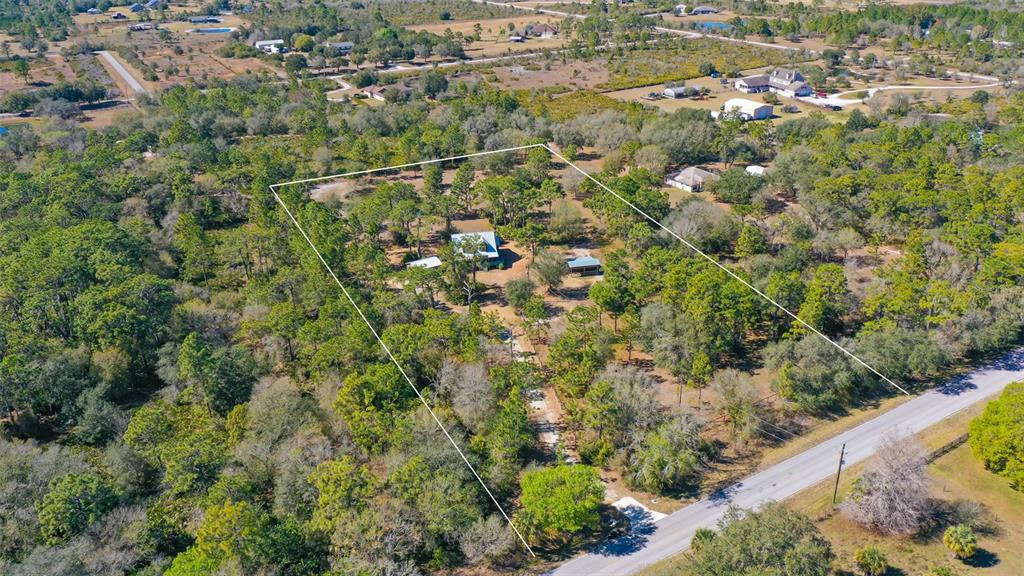 7076 Verna Bethany Road Myakka City, FL 34251 - Photo 1 of 1 This adorable almost new log cabin and barn is located on 5+ acres of great pasture, fenced and cross fenced located in the popular equestrian community, Pomello Ranches.