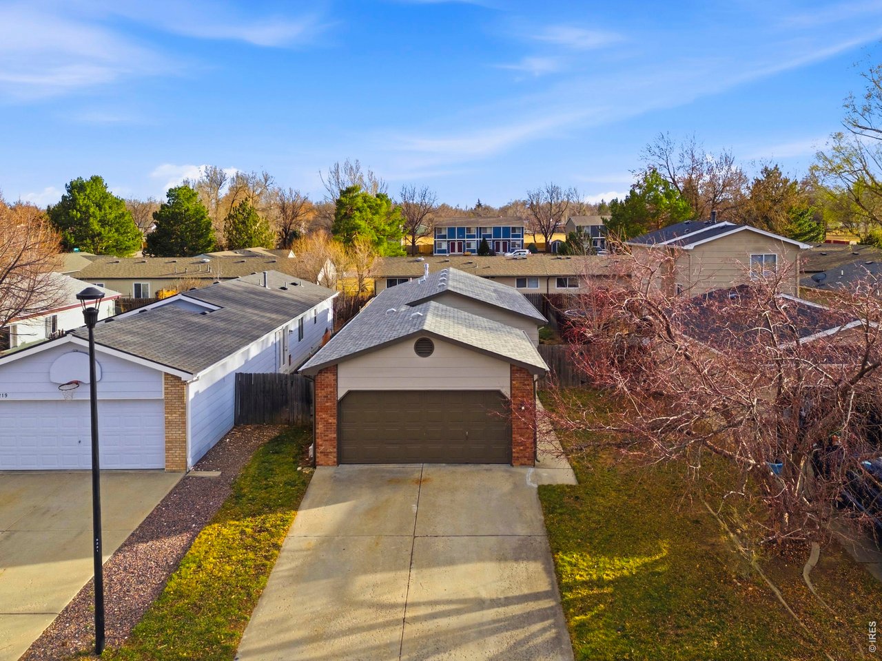 1225 Alameda Street Fort Collins, CO 80521 - Photo 19 of 32 a aerial view of a house with a yard