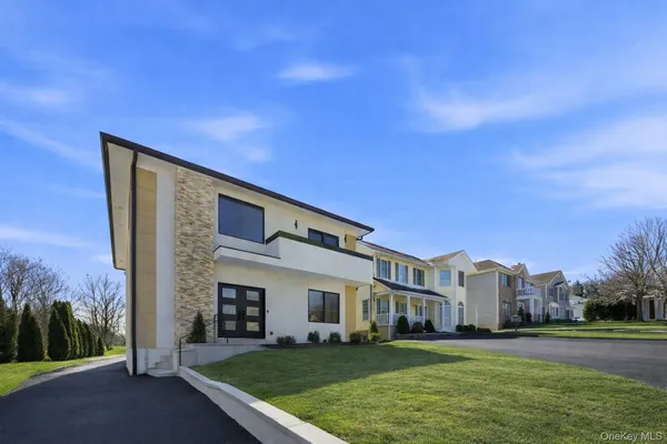 a view of a house with a big yard