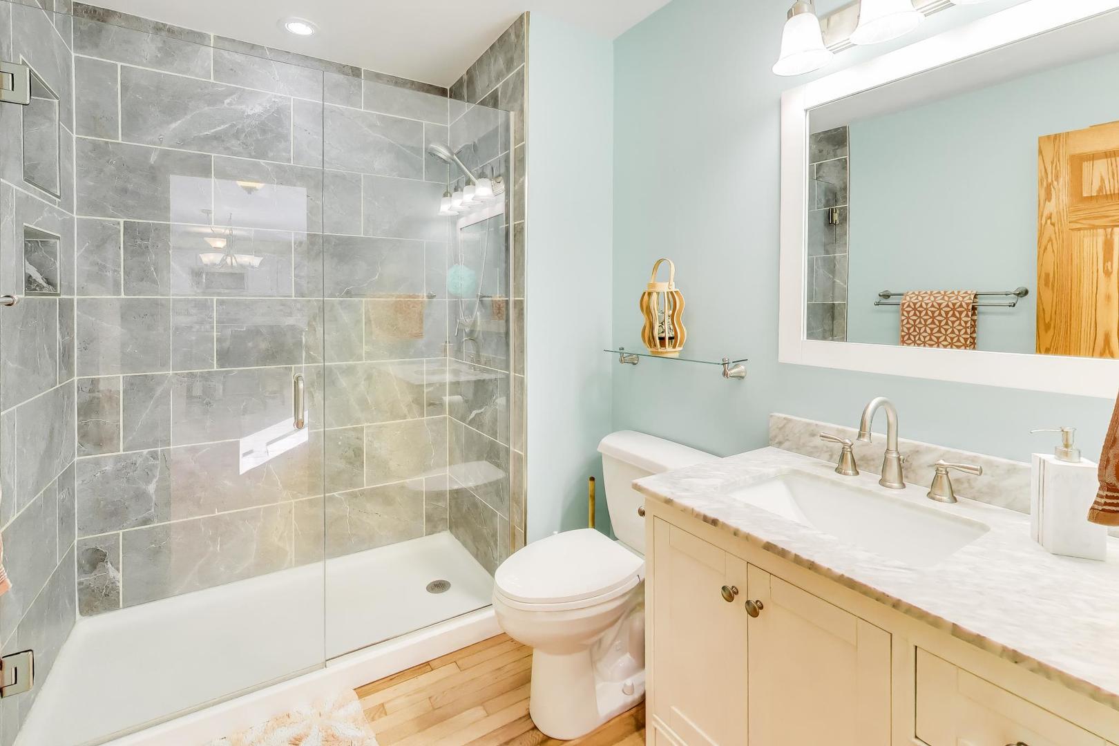 37464 North Terrace Lane Spring Grove, IL 60081 - Photo 16 of 40 a bathroom with a sink a toilet and shower