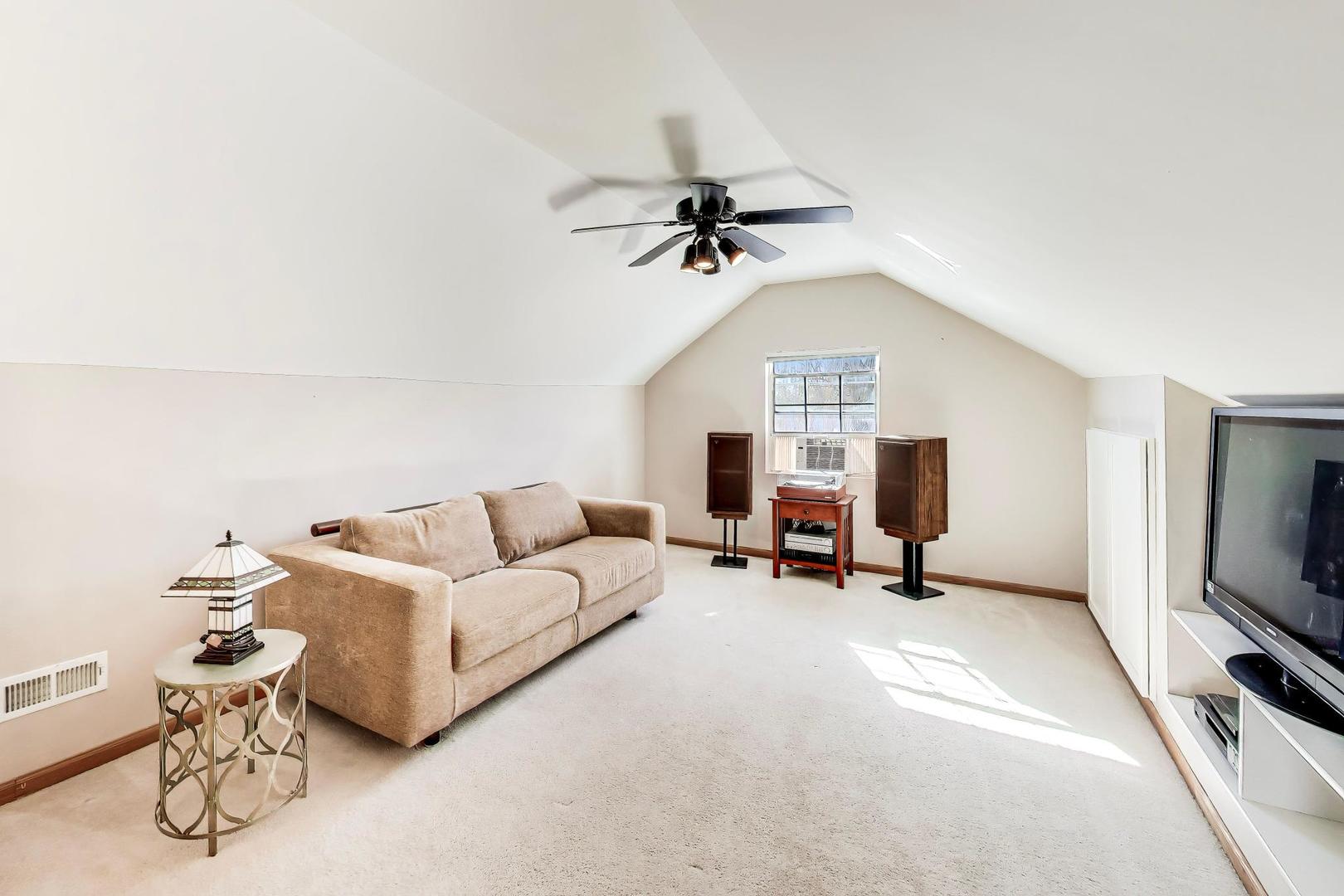 37464 North Terrace Lane Spring Grove, IL 60081 - Photo 19 of 40 a living room with furniture and a flat screen tv