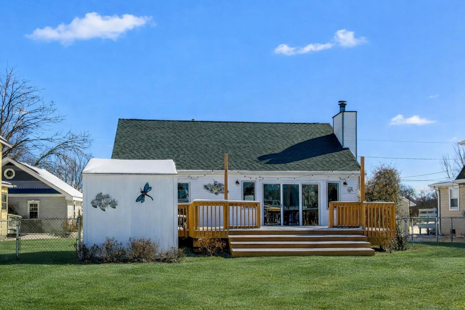 37464 North Terrace Lane Spring Grove, IL 60081 - Photo 27 of 40 a front view of a house with a garden