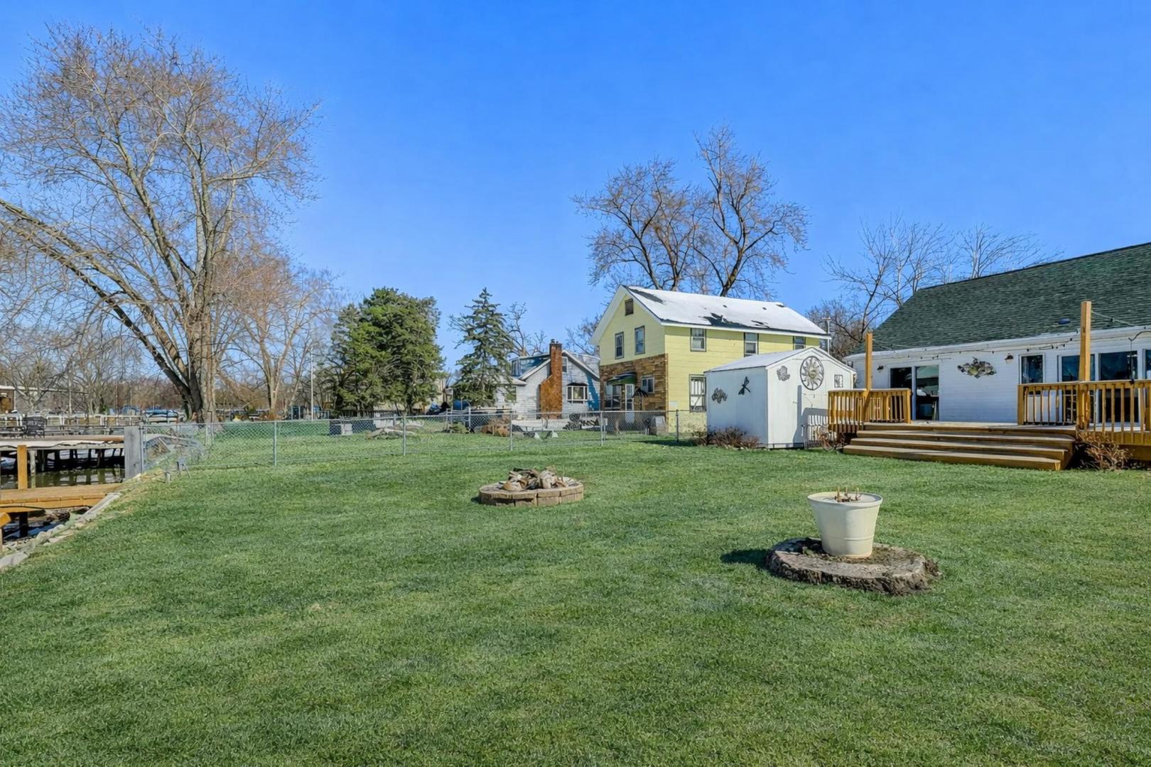37464 North Terrace Lane Spring Grove, IL 60081 - Photo 29 of 40 a view of a house with a back yard