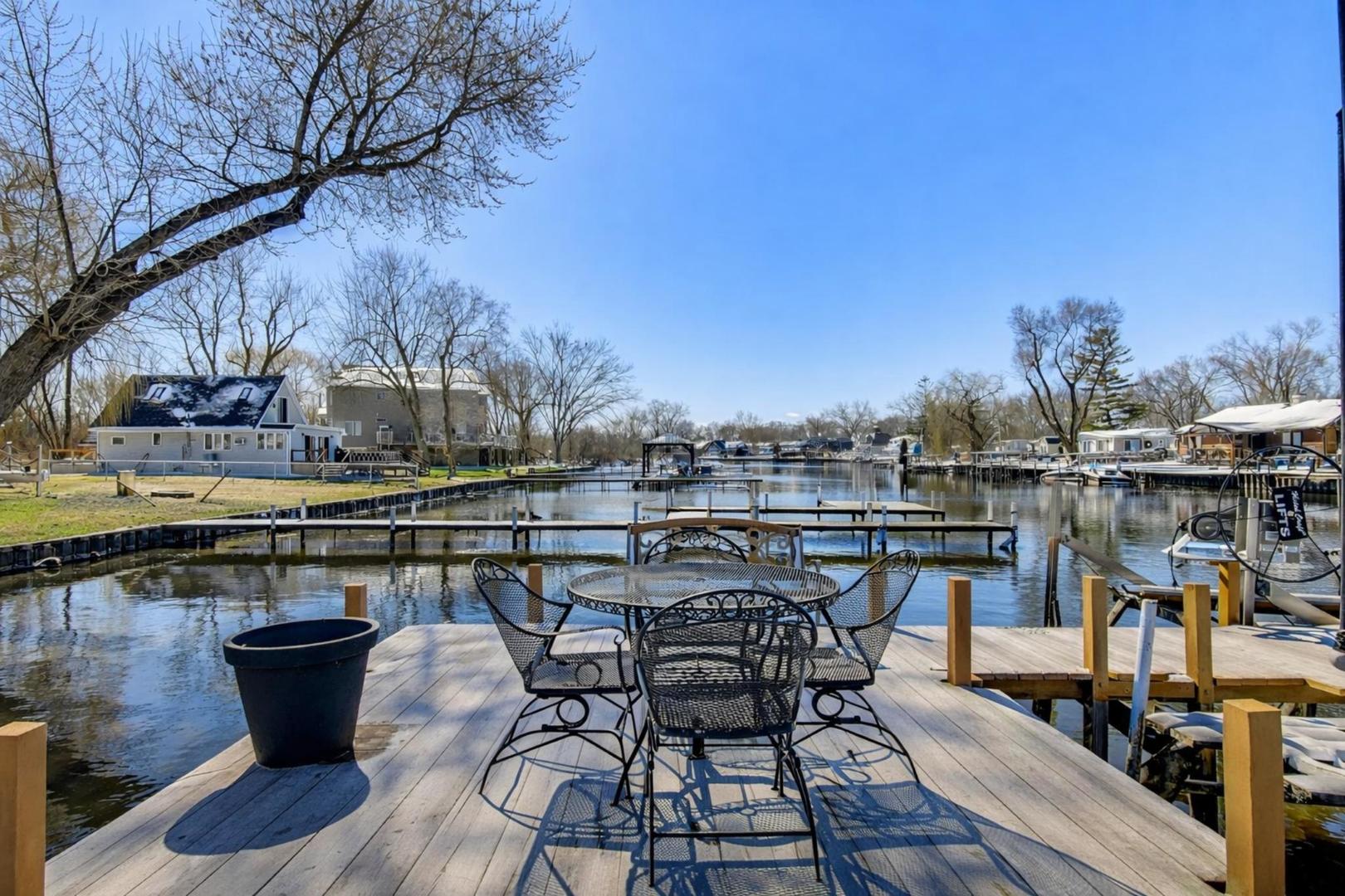 37464 North Terrace Lane Spring Grove, IL 60081 - Photo 35 of 40 a view of a roof deck with table and chairs