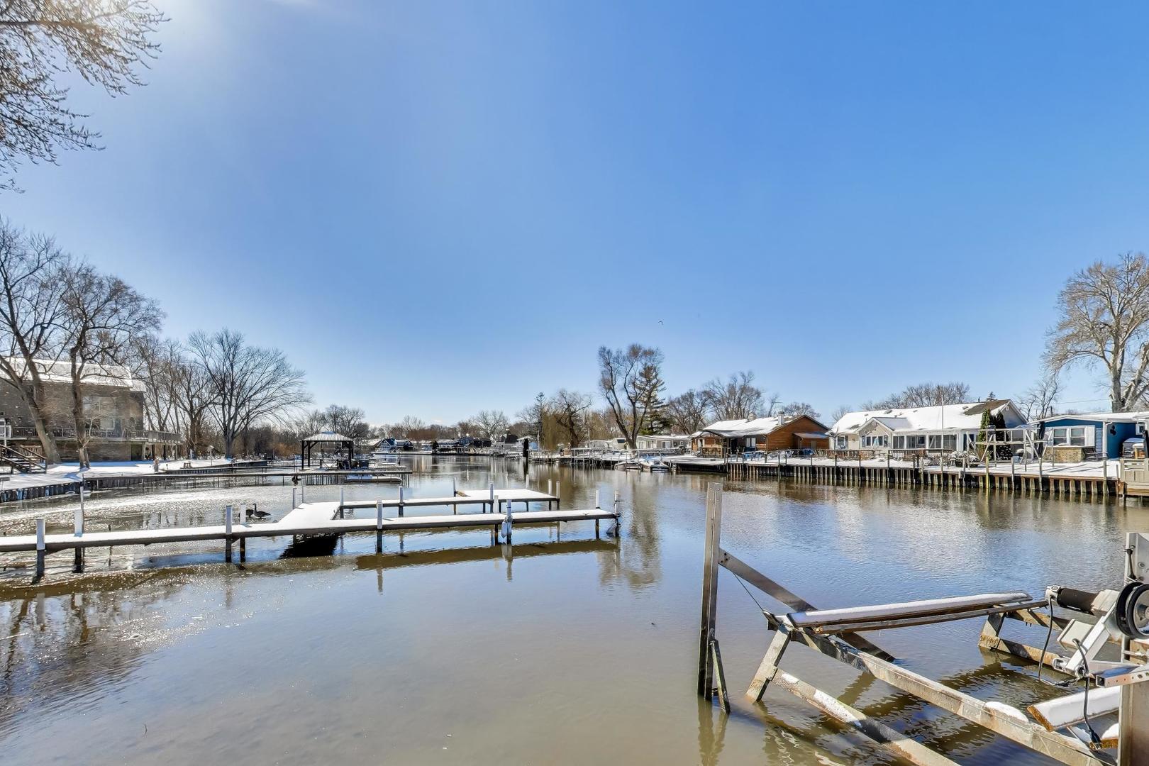 37464 North Terrace Lane Spring Grove, IL 60081 - Photo 37 of 40 a view of a lake with boats and trees