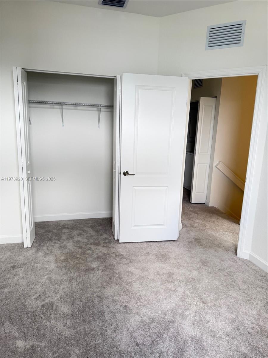 17953 Southwest 359th Street Homestead, FL 33034 - Photo 21 of 36 a view of an empty room