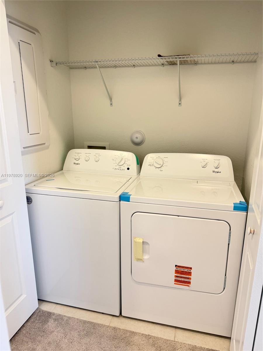 17953 Southwest 359th Street Homestead, FL 33034 - Photo 24 of 36 a utility room with dryer and washer