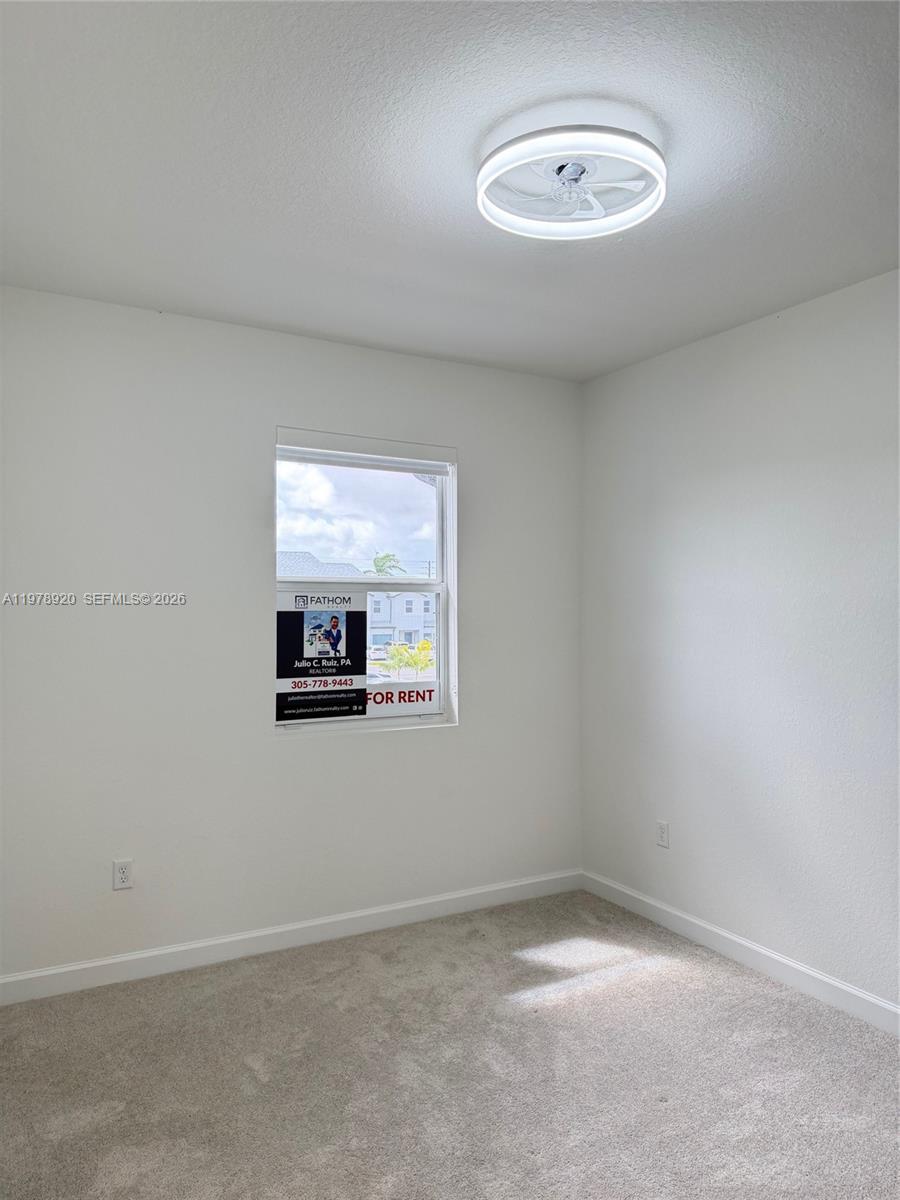 17953 Southwest 359th Street Homestead, FL 33034 - Photo 28 of 36 a view of a room with a window