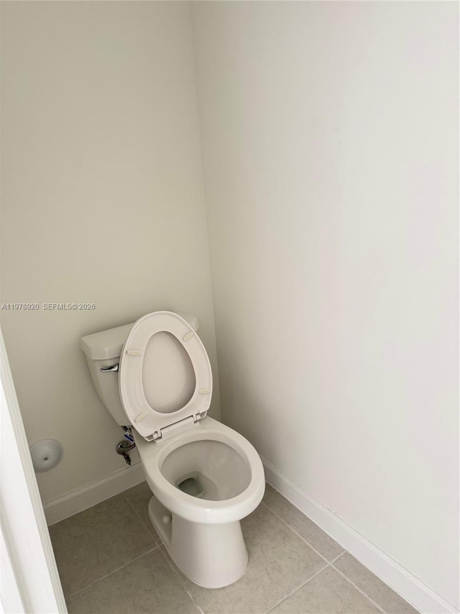 17953 Southwest 359th Street Homestead, FL 33034 - Photo 32 of 36 a close up of a toilet and a sink