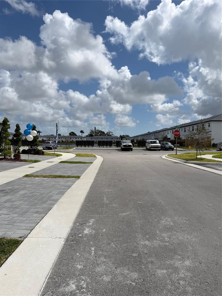 17953 Southwest 359th Street Homestead, FL 33034 - Photo 5 of 36 a view of an swimming pool and tennis court