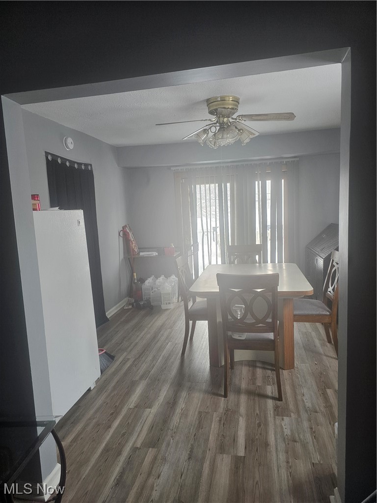 25150 Columbus Road Bedford Heights, OH 44146 - Photo 13 of 30 Dining room featuring light wood finished floors and ceiling fan