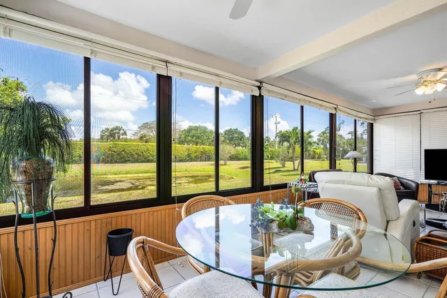 a living room with large windows
