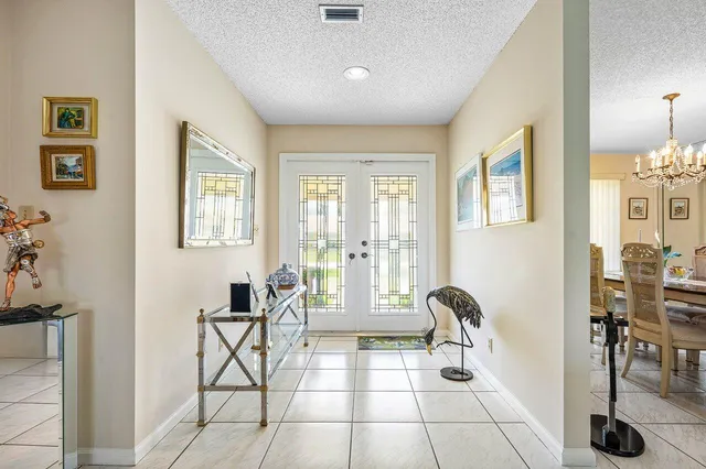 a view of a livingroom with furniture and windows