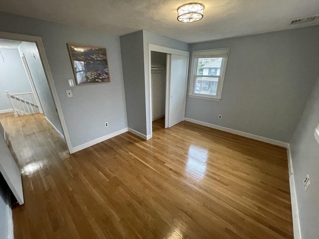 18 Charles Street Lexington, MA 02421 - Photo 11 of 30 an empty room with windows